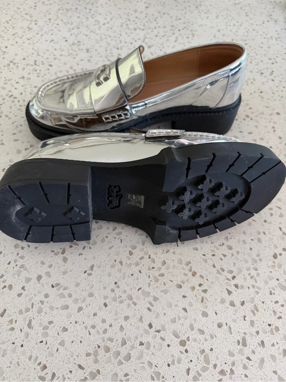 Coach Leah Women’s Silver Metallic Lug Sole Loafers